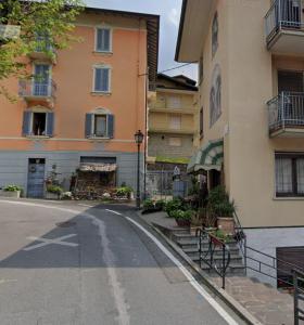 an empty street in front of a building at Villa Grazia in Serina