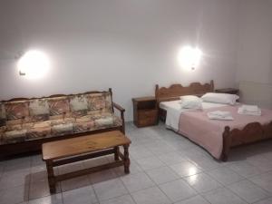 Postel nebo postele na pokoji v ubytování Apollonio Nikopolis