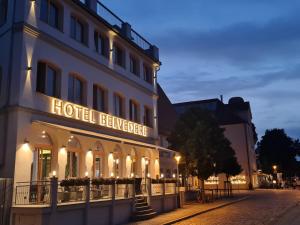 a hotel building with a sign that reads hotel beeper at Hotel Belvedere in Warnemünde