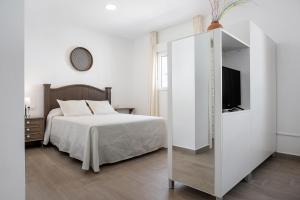 Postel nebo postele na pokoji v ubytování Casa de 10 - 2 Interior