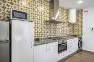 Kuchyňa alebo kuchynka v ubytovaní Casa de 10 - 4 Interior