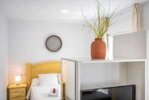 Posteľ alebo postele v izbe v ubytovaní Casa de 10 - 4 Interior
