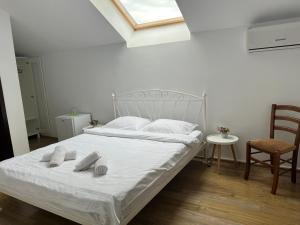 Postel nebo postele na pokoji v ubytování Vila Ann