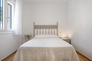 Ένα ή περισσότερα κρεβάτια σε δωμάτιο στο Casa de 10 - 1a +22 φωτογραφίες