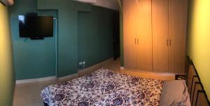 Postel nebo postele na pokoji v ubytování Navona Towers Amplio Apart, Dos Noches minimo, para 4 personas lo mejor de Panamá