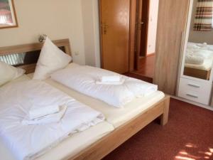 Tempat tidur dalam kamar di Haus Strandgang, Whg 9
