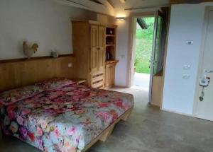 Ein Bett oder Betten in einem Zimmer der Unterkunft Locazione turista Cocodè