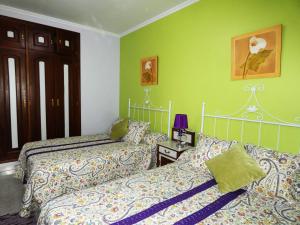 Cama o camas de una habitación en Casa Daniel