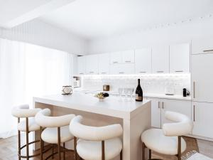 A kitchen or kitchenette at Luxury 3BR Apartment in the Heart of the City