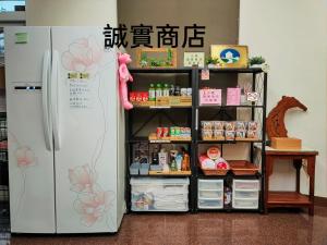 Kuchyň nebo kuchyňský kout v ubytování 小雅民宿 Oo自助入住旅店oO