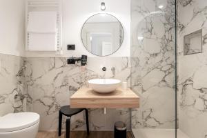 Kúpeľňa v ubytovaní Nelli Rooms Via Veneto + 15 fotografií