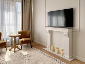 Telewizja i/lub zestaw kina domowego w obiekcie Kurkowa Apartments