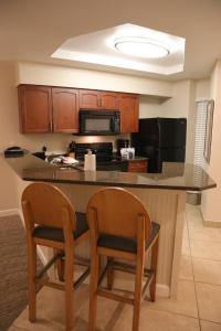Unit at the Sheraton Broadway Plantation的厨房或小厨房