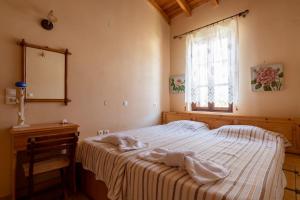 Postel nebo postele na pokoji v ubytování Villa Leleka
