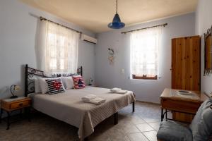 Postel nebo postele na pokoji v ubytování Villa Leleka