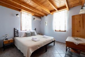 Postel nebo postele na pokoji v ubytování Villa Leleka