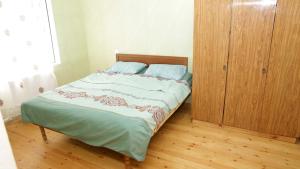 Un pat sau paturi într-o cameră la Bon Apart