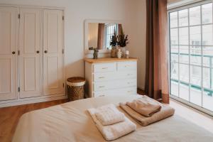 Ένα ή περισσότερα κρεβάτια σε δωμάτιο στο Villa Rafa