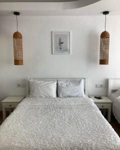 Кровать или кровати в номере Yilmaz Hotel
