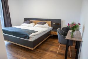 Postel nebo postele na pokoji v ubytování Konrads Pension