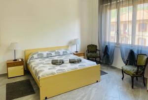 Postel nebo postele na pokoji v ubytování SUNNY HOLIDAY HOME