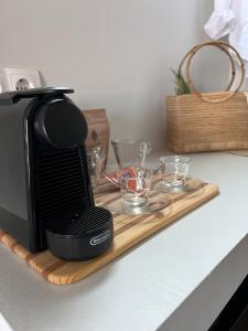 Příslušenství pro přípravu čaje a kávy v ubytování The nook suite