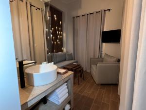 TV a/nebo společenská místnost v ubytování The nook suite