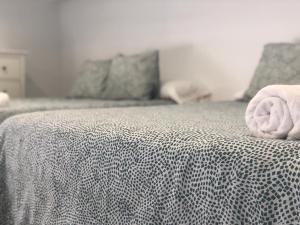 Posteľ alebo postele v izbe v ubytovaní Apartamento López