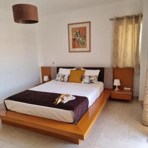 Postel nebo postele na pokoji v ubytování Casa Dos Cedros
