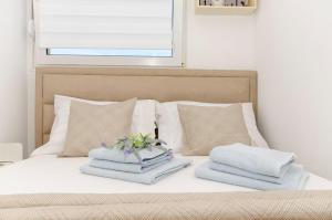 Posteľ alebo postele v izbe v ubytovaní Three bedroom apartment with sea view and secure private garage