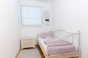 Posteľ alebo postele v izbe v ubytovaní Three bedroom apartment with sea view and secure private garage