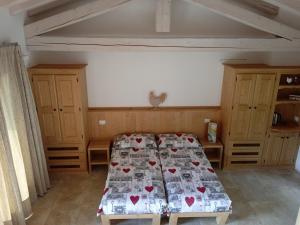 Ein Bett oder Betten in einem Zimmer der Unterkunft Locazione turista Cocodè