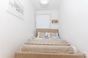 Posteľ alebo postele v izbe v ubytovaní Three bedroom apartment with sea view and secure private garage