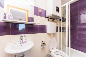 Phòng tắm tại Apartments Nina +58 ảnh