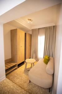 Postel nebo postele na pokoji v ubytování Prosbel Hotel