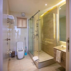 Koupelna v ubytování Prosbel Hotel