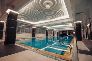 Bazén v ubytování Stella Residence Club nebo v jeho okolí