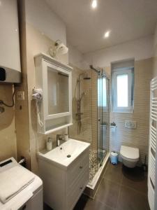 Kúpeľňa v ubytovaní Apartment Villa Edmea 2