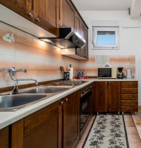 Küche/Küchenzeile in der Unterkunft Dijamant Apartment