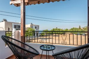 A balcony or terrace at ApteraMare Tradidtional house 'New listing'