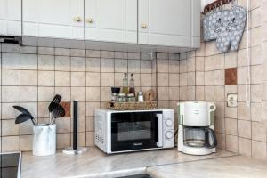 A kitchen or kitchenette at ApteraMare Tradidtional house 'New listing'