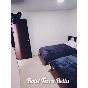Hotel Terra Bella客房内的一张或多张床位
