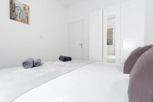 Łóżko lub łóżka w pokoju w obiekcie Bora Apartment Pula