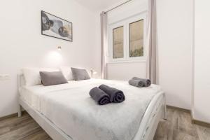 Łóżko lub łóżka w pokoju w obiekcie Bora Apartment Pula