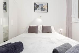 Łóżko lub łóżka w pokoju w obiekcie Bora Apartment Pula
