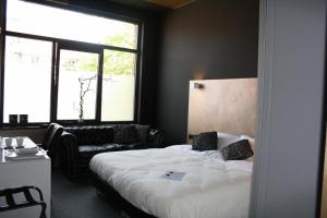 Letto o letti in una camera di Hotel Moon