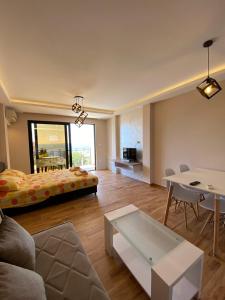 Ruang duduk di Apartman Joja2