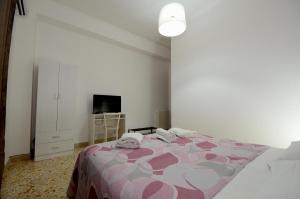 Posteľ alebo postele v izbe v ubytovaní La Casa del Moro - Al Politeama