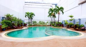 La alberca dentro o cerca de Centara Udon