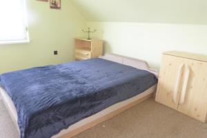 Posteľ alebo postele v izbe v ubytovaní Labdarozsa Apartmanhouse